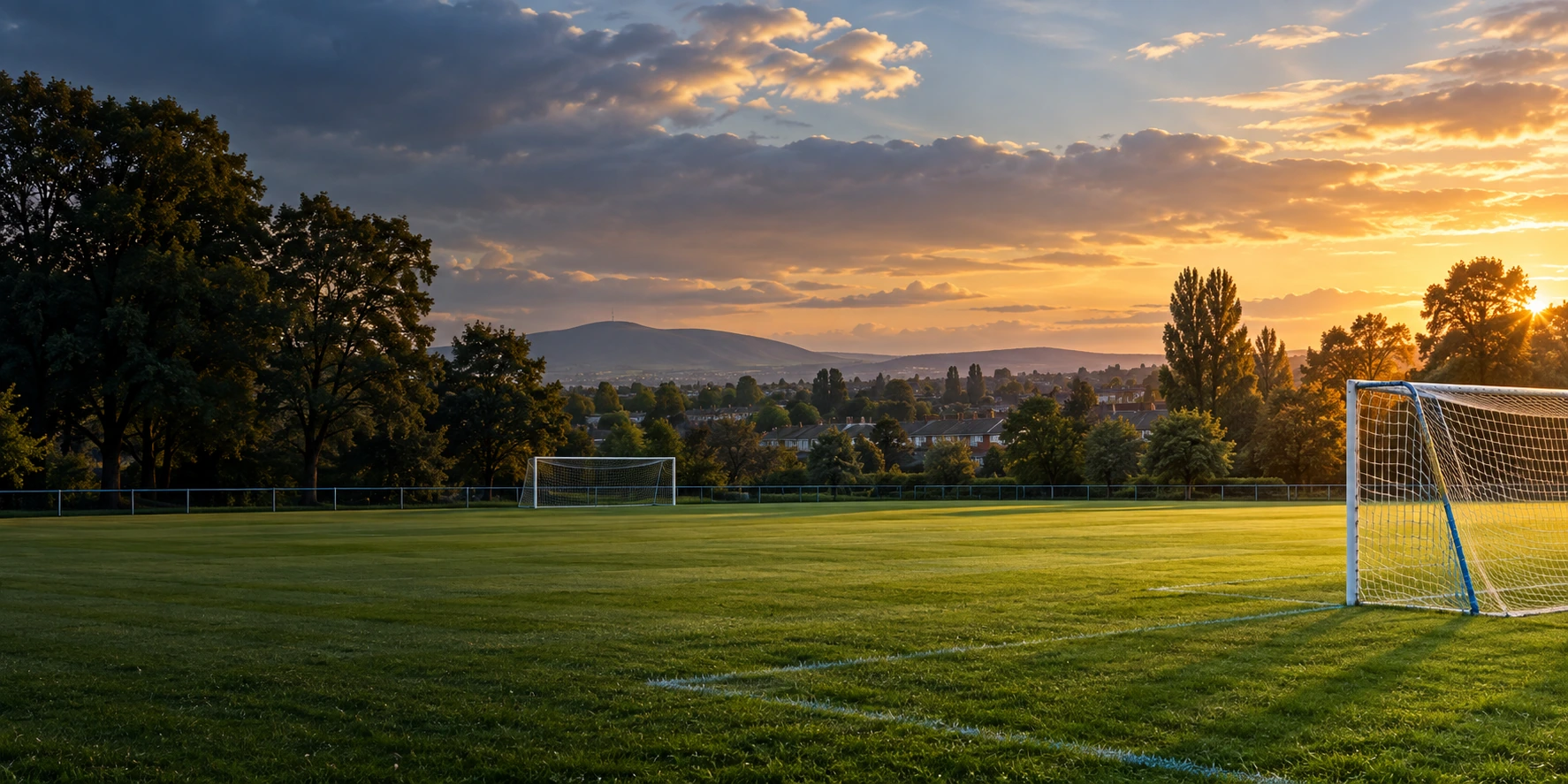 Rivermount Boys FC crest over a Finglas football pitch in Tolka Valley Park